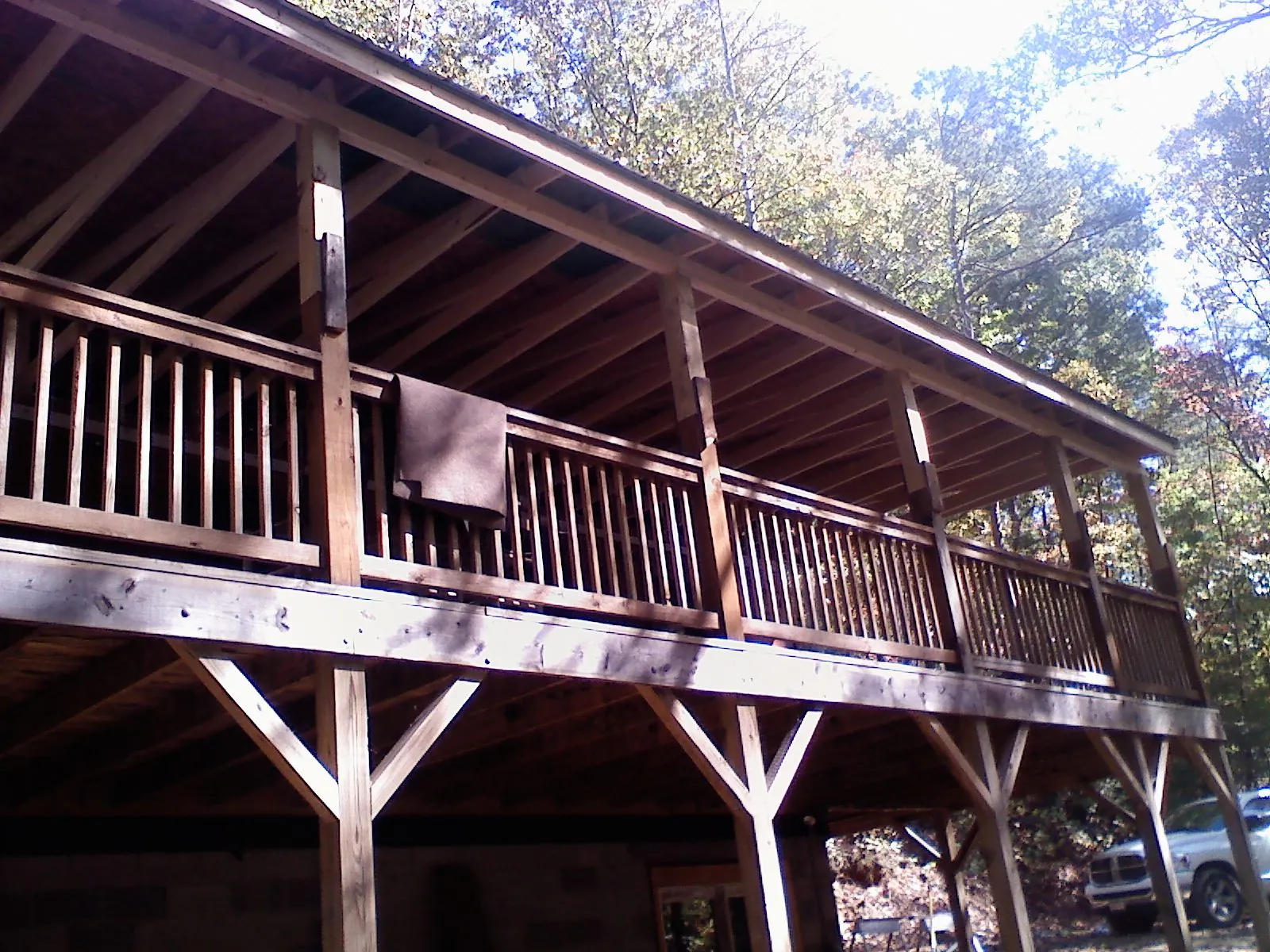 Timber framing under a new elevated porch and deck — Roof Leak Repair in Midway by Roofing Brothers